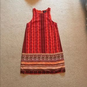 Francesca’s orange pattern dress